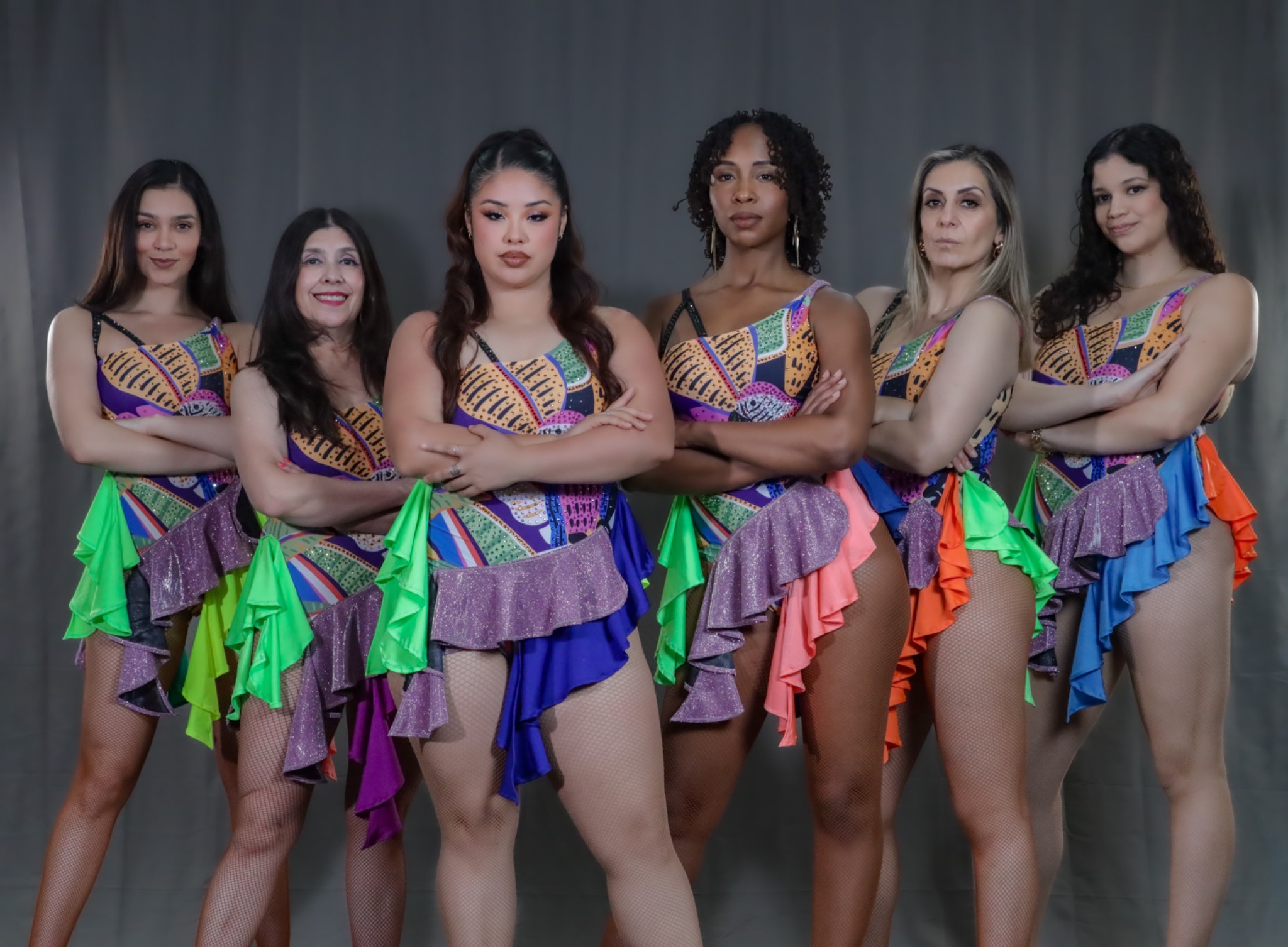 ÌDÁSÍLẸ̀ dancers in colorful performance costumes